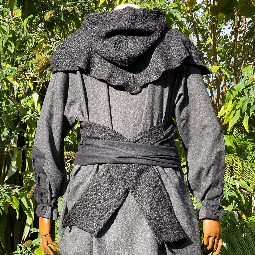This LARP Hood is Black with a Wrap Around Woollen extention. This Viking Scarf Hood is Water Resistant and Warm. You can style the Extended arms of the LARP Hood to fit your needs: perfect for your LARP Character and LARP Costume, Cosplay Event, and Ren Faire.