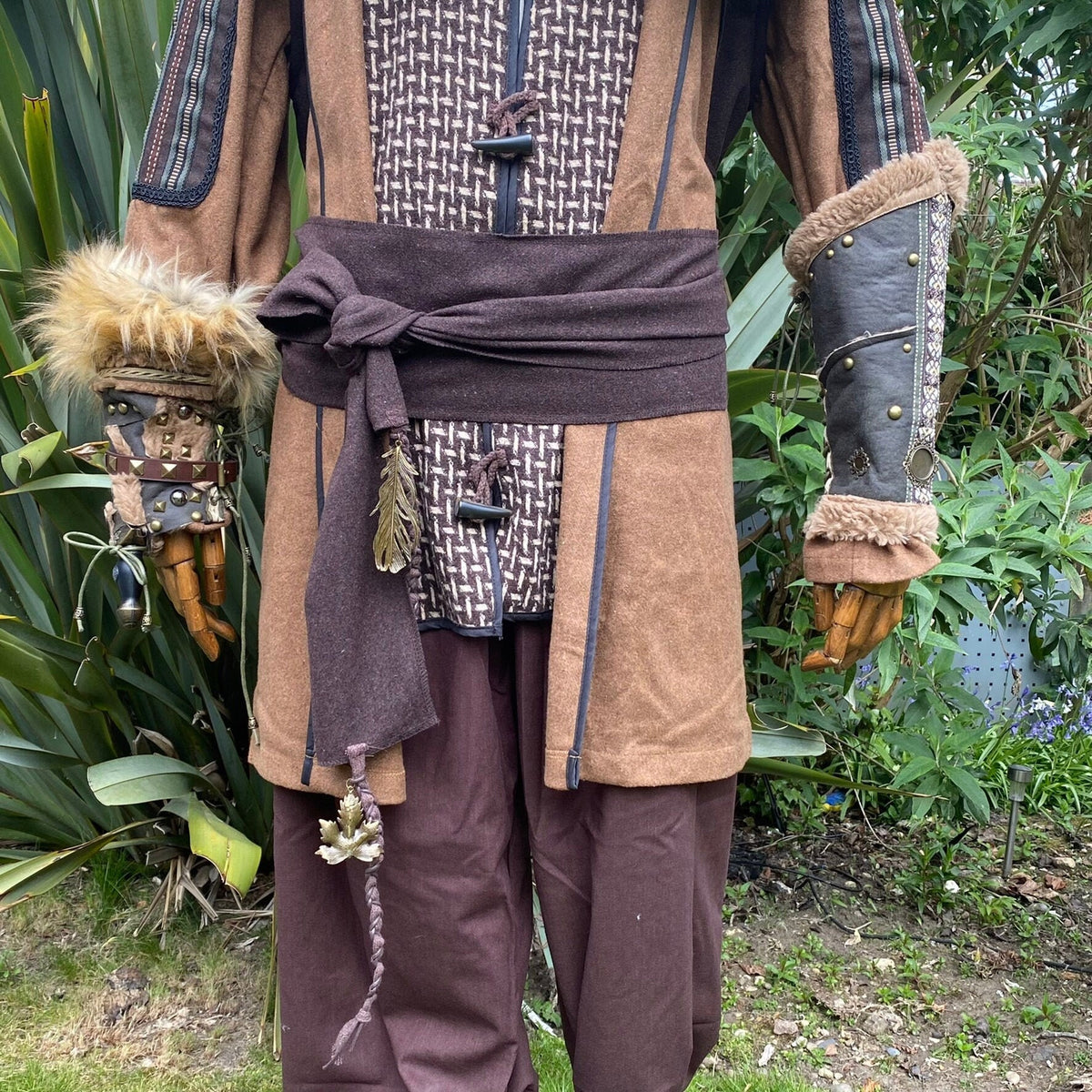Brown LARP sash with feather and braided detail, medieval.