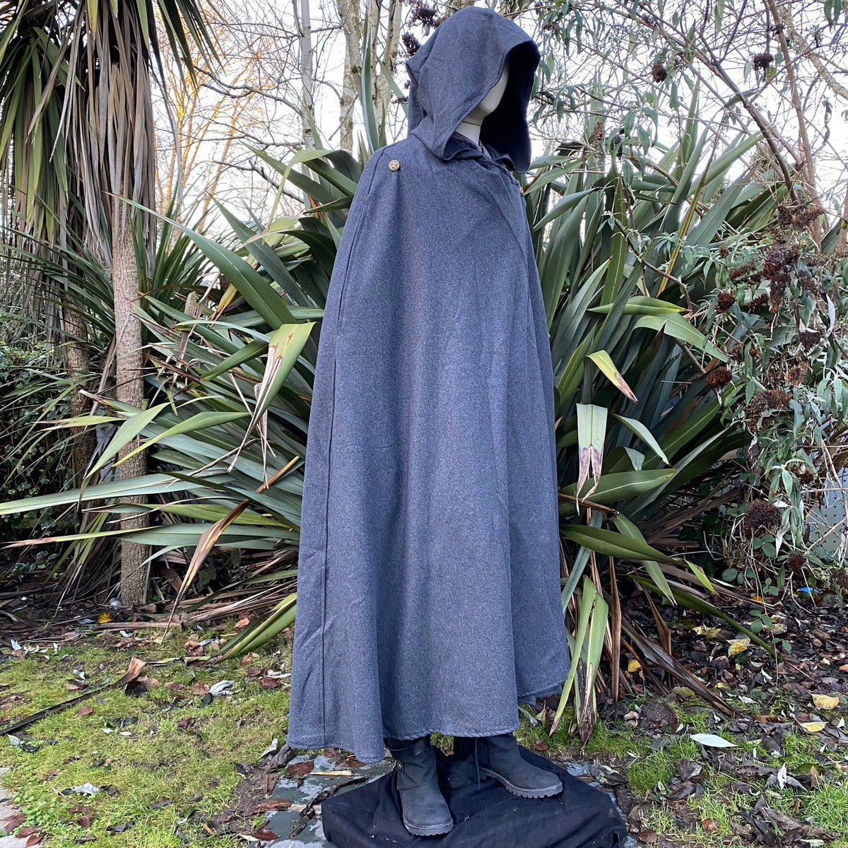 Grey hooded cloak for medieval LARP, displayed, leafy background.