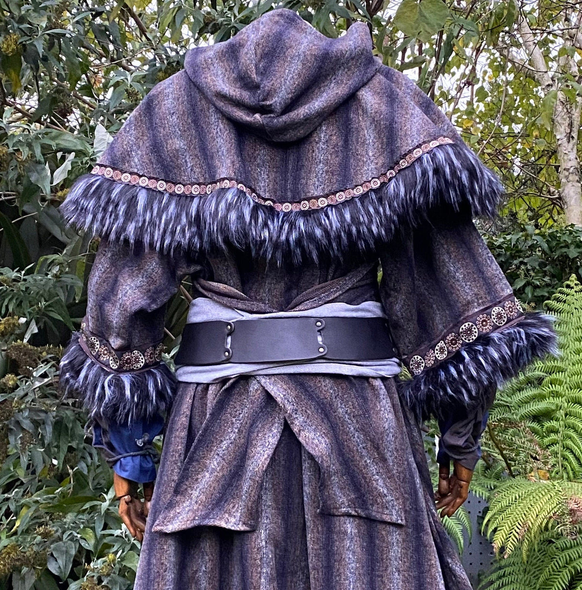 Back view of blue-grey LARP mohair hood, faux fur trim and ornate belt detailing.