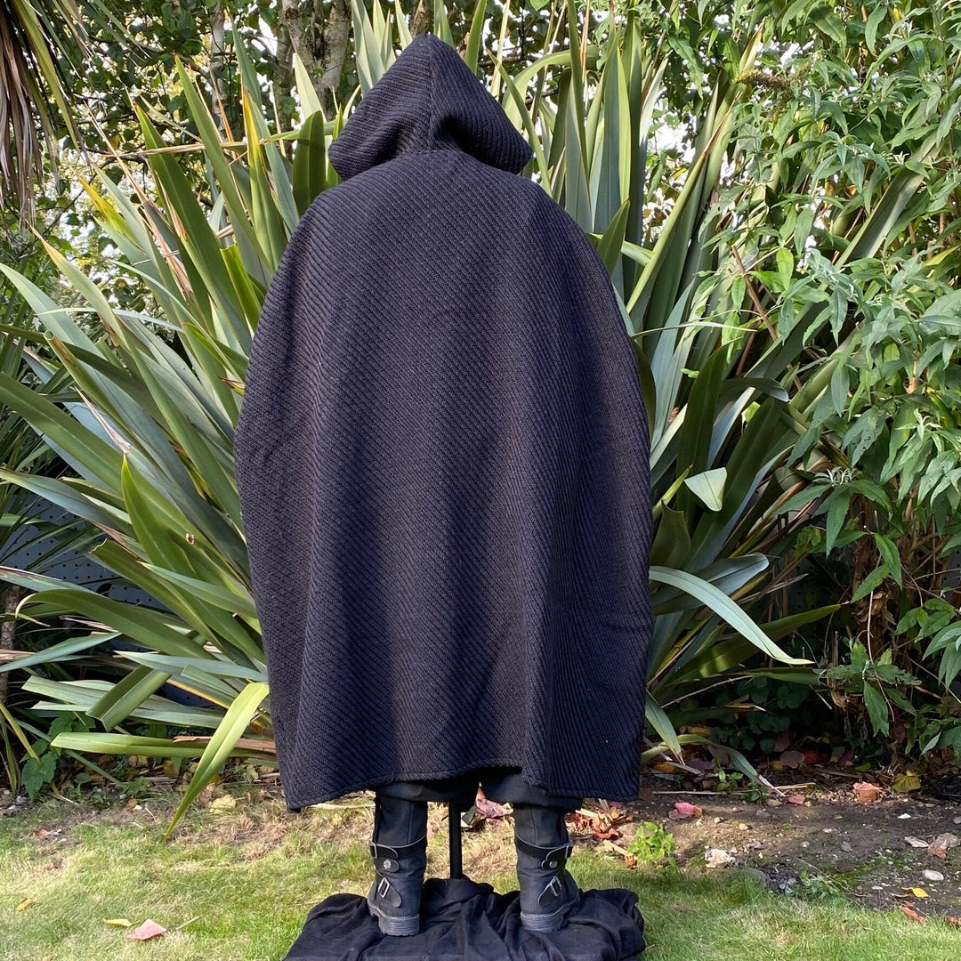 This LARP Cloak in Black Wool has two Cross Over Straps that can tie together, or into existing costume. The Medieval Cloak is Water Resistant and helps keep you warm. The Viking Cape's Wrap Around Straps help keep the cape on your shoulders; perfect for your LARP character, Cosplay Events, and Ren Faires. 