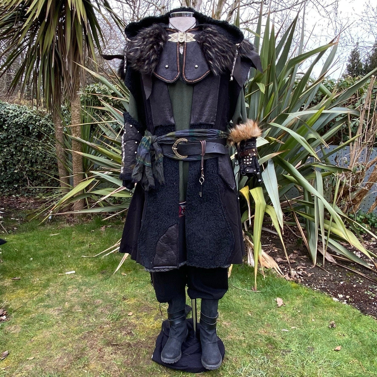 Winter King LARP outfit with fur-trimmed waistcoat and layered accessories.