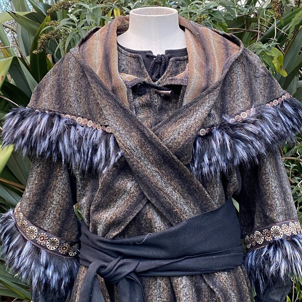 This LARP Hood in Brown & Black Moahir Wool has Faux Fur Trimming in Black & Grey with Braiding. This Viking Hood is Water Resistant towards rain. The Medieval Hood covers your shoulders and provides warmth. Perfect for your LARP Character and LARP Costume, Cosplay Event, and Ren Faire.