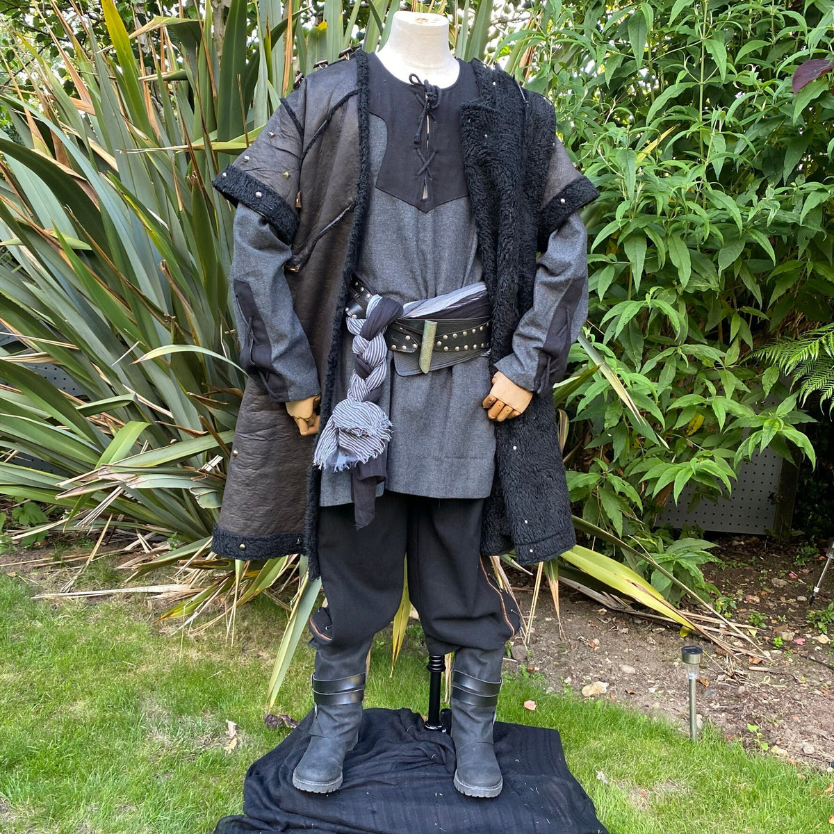 Mannequin in black faux leather tunic with studs, layered for medieval LARP.