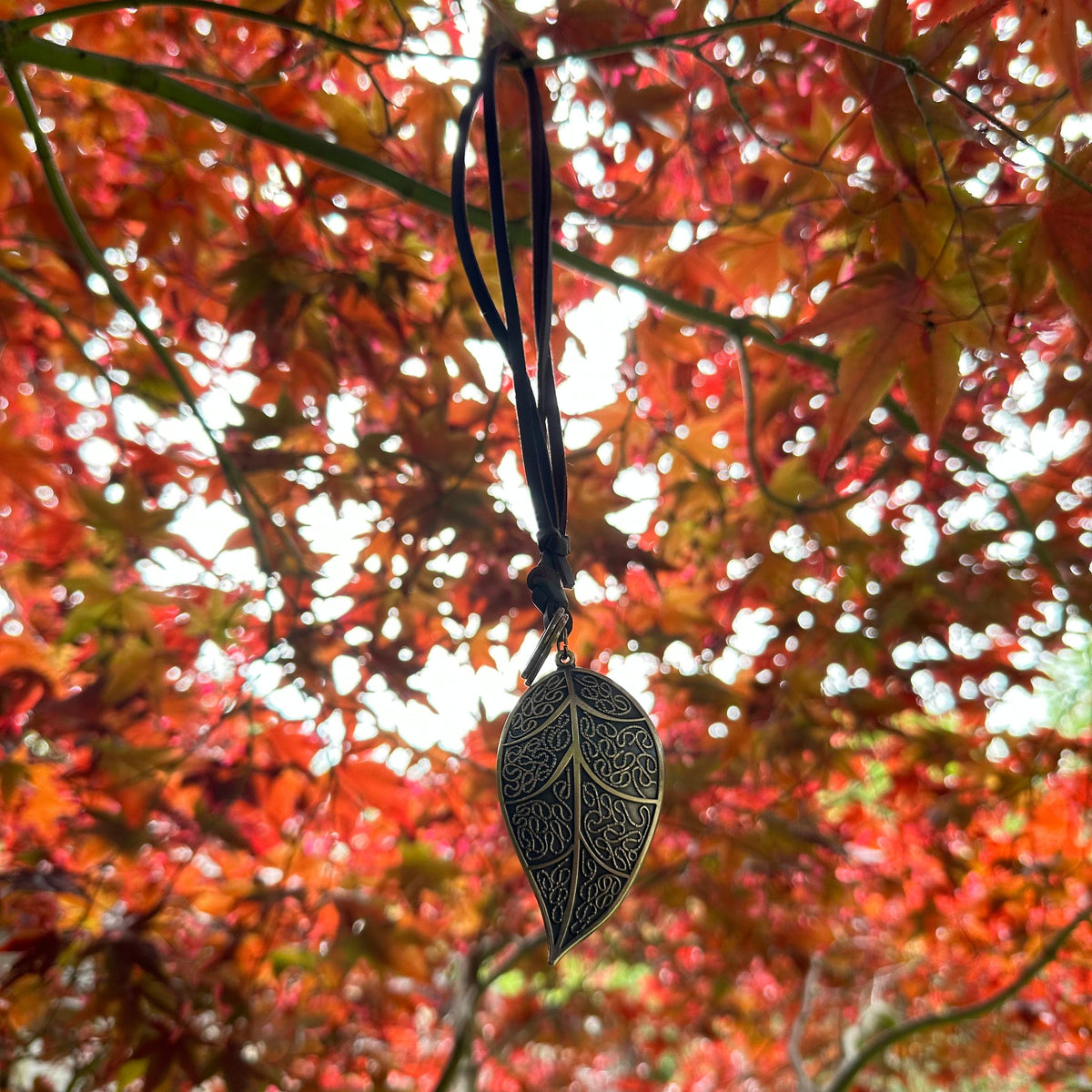 Elegant brass leaf necklace with intricate vines, LARP medieval accessory.
