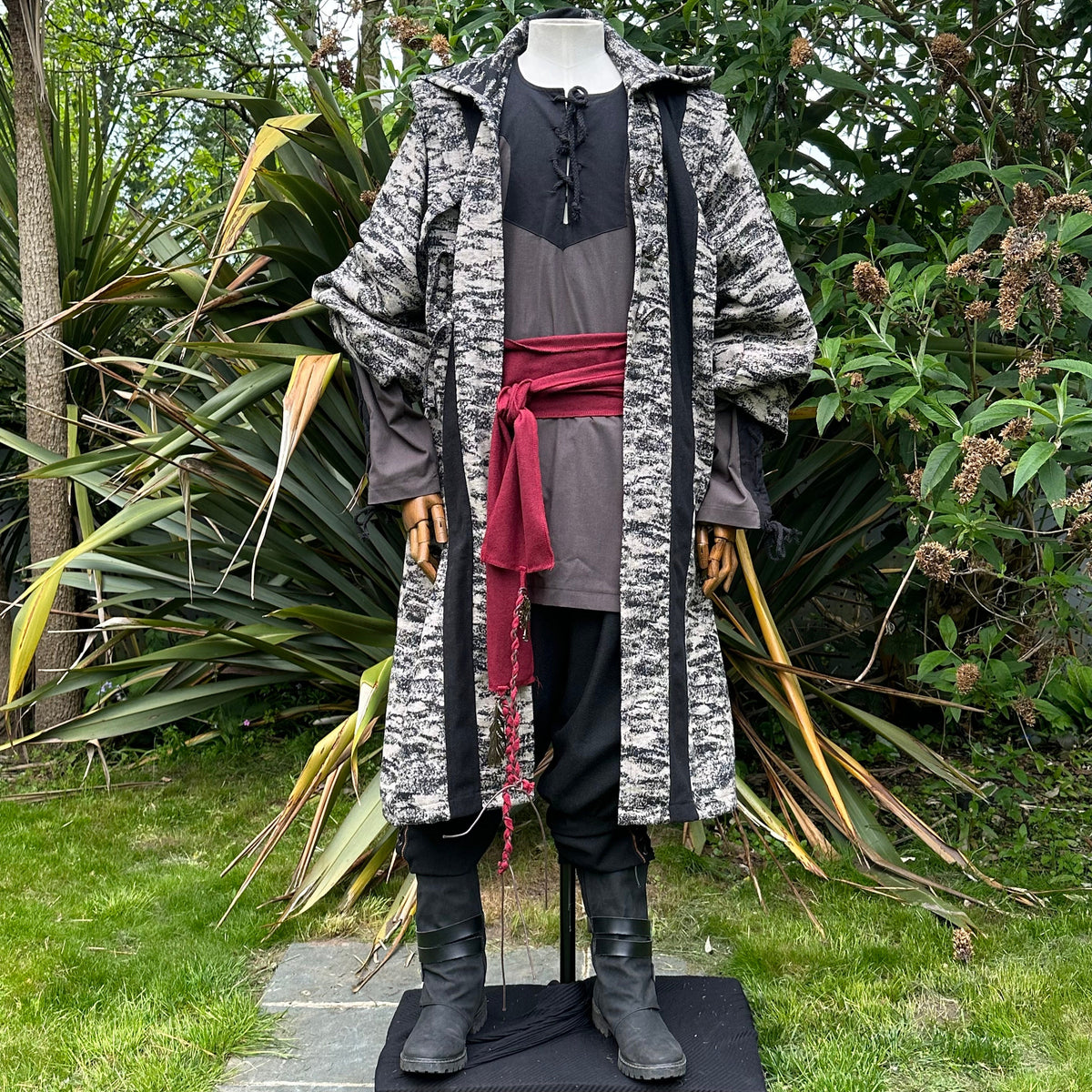 Front view of beige and black hooded LARP robe, medieval fantasy cosplay costume for wizards.