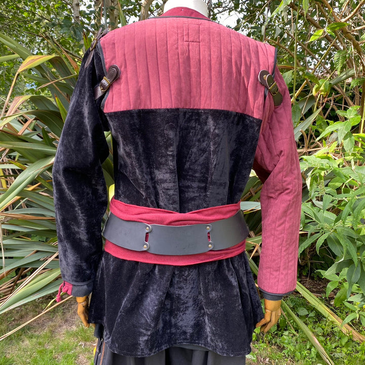 This LARP Gambeson Jacket comes in Black & Red Faux Suede. The LARP Armor has Removeable Sleeves that attach at the shoulder. The Padded Armor is warm and water resistant. This Jacket is perfect for your LARP Costume and LARP Character, Cosplay Events, and Ren Faires.